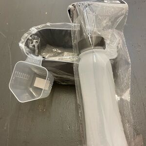 Redken bowl,bottle, and measuring cup